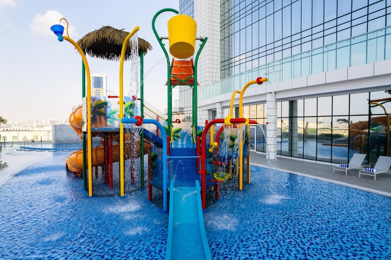 Adagio Jumeirah Village Triangle Dubai Esterno foto